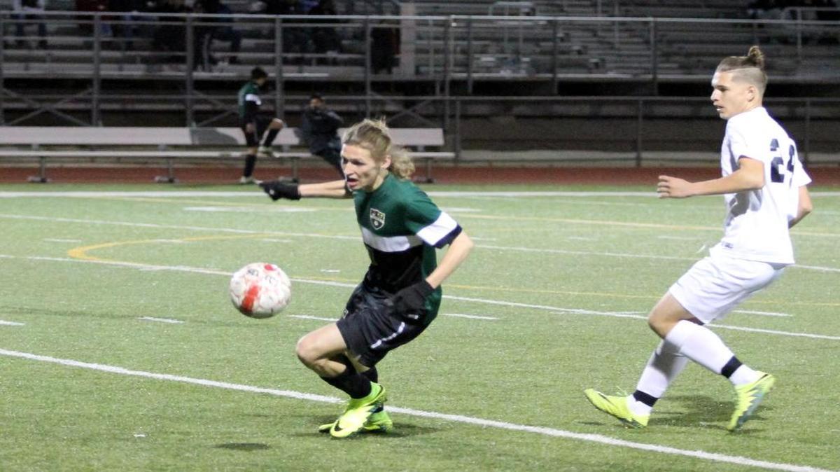 Carroll’s Michael Kays, left, has stepped up his scoring in the absense of the injured Nat Kajiwara.