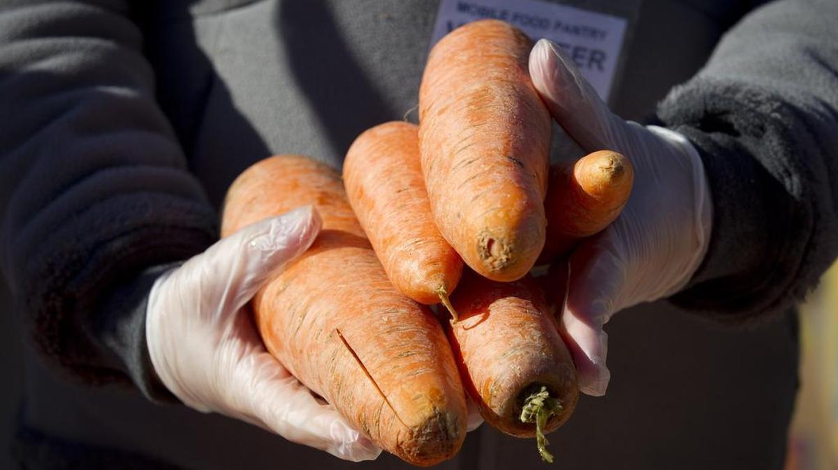 Volunteers fill grocery carts with healthy food for hundreds of people in the Hurst-Euless-Bedford area. Mission Central and First United Methodist Church jointly operate a mobile food pantry where fresh produce and other perishable foods are available once a month in the Fort Worth, Texas area.