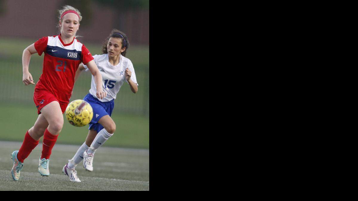 
Grapevine's Sophia Smith (21) keeps the ball away from Joshua's Destiny Keeble (15) in last week’s victory. 
