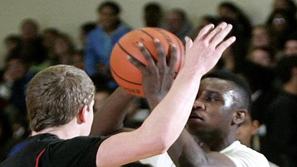 Former L.D. Bell guard Akeem Black shoots in a 2014 high school game. At one point Black was ready to give up the game, but he came back and now plays collegiately.