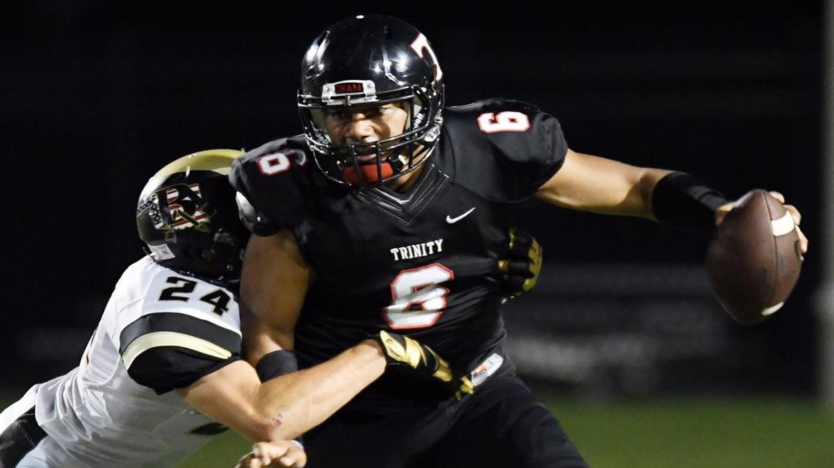 Trinity quarterback Malini Maile threw four touchdown passes in the victory over Bell last week.
