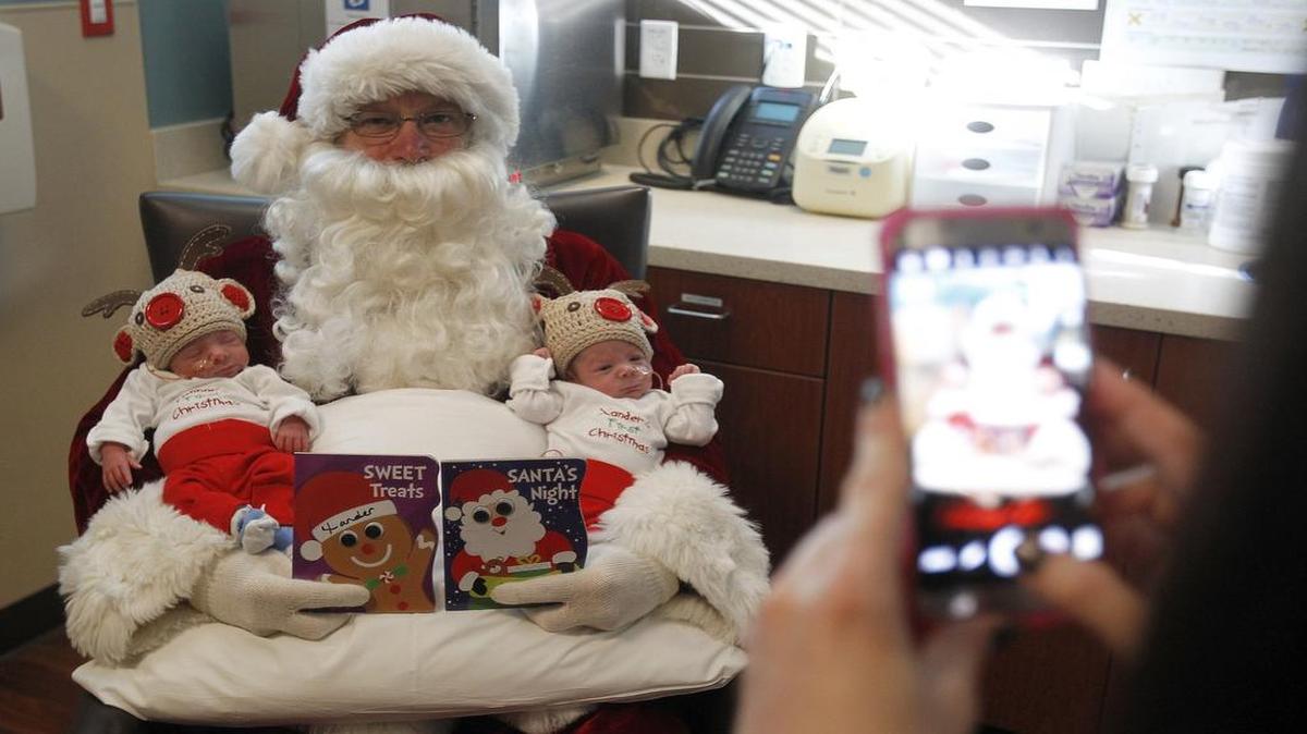 Santa visits newborn twins Connor Cashion, left, and Xander Cashion at the neonatal unit at Baylor Scott & White Medical Center.