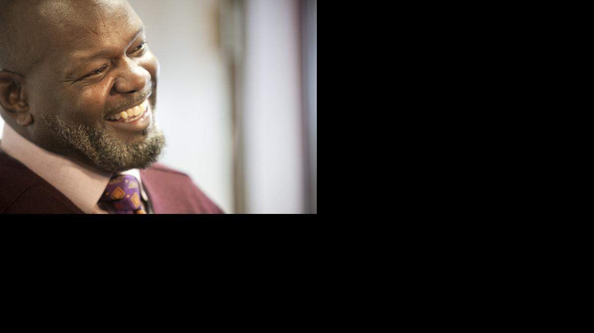 
Emmitt Smith laughs during an appearance in Southlake on Feb. 17. He was at PenFed Credit Union to donate money to Home for Our Troops and Toys for Tots.
