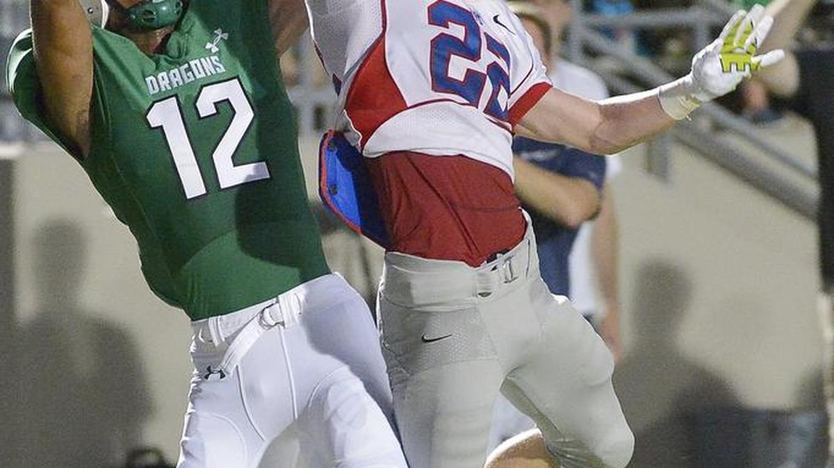 
Carroll receiver Zach Farrar, left, could be a mainstay of the Dragons offense this season regardless of who the passer is. 
