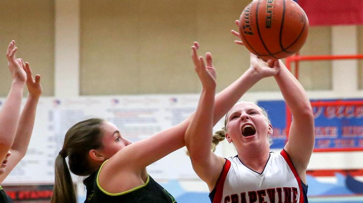 Grapevine forward Tatum Tellin, right, has been asked to take more shots rather than handing the ball off.
