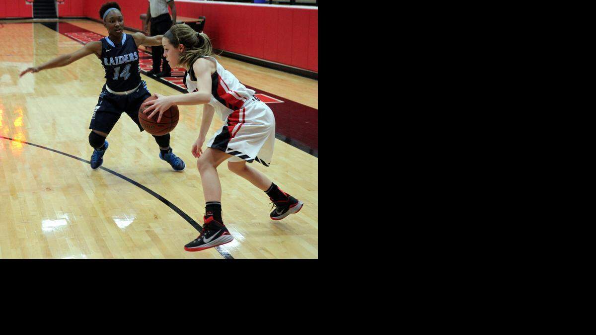 
McKinley Charles, right, goes up against the press of L.D. Bell in the final minutes of last Friday’s victory.
