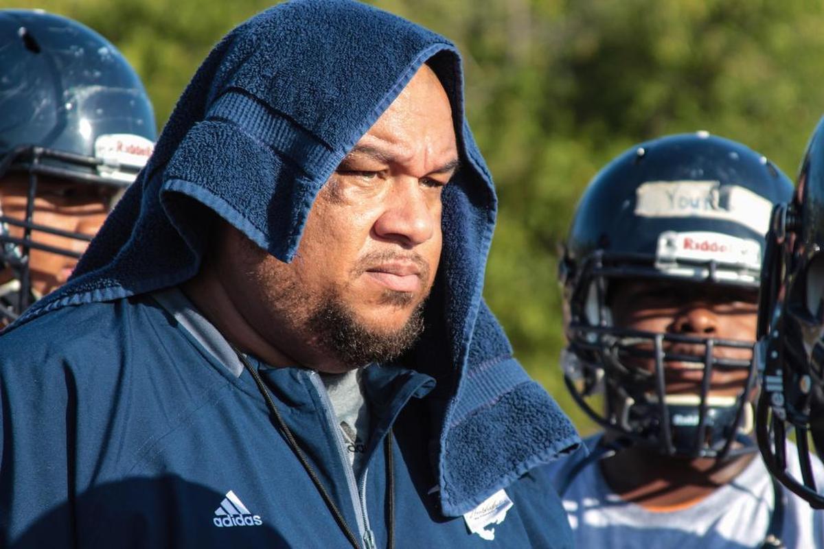 Joseph Heath, head coach at the Young Men’s Leadership Academy in east Fort Worth, did his best to keep himself and his players cool during a practice last year.