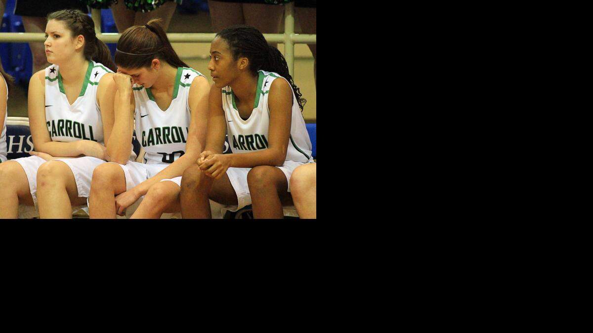 
Carroll forward Juls Grubbs, center, continues to rehabilitate from an injury and could rejoin the team within a few weeks.
