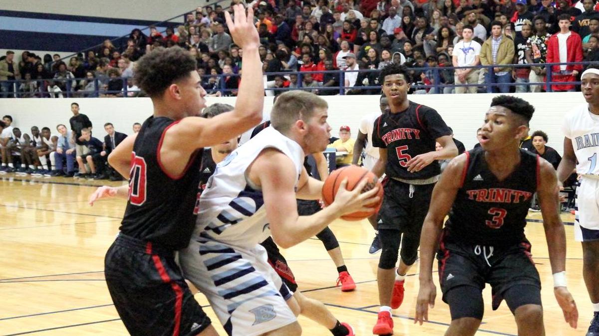 Bell senior Boston Billings, center, says he’d like to continue the Bell tradition of holiday giving in college and as a possible future coach.