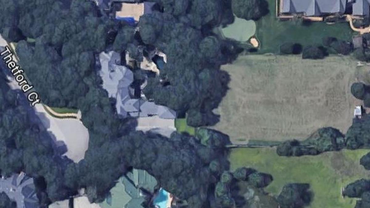 Police have arrested one of two suspects accused of bluffing their way into a woman’s home in the 1400 block of Thetford Court on May 2.