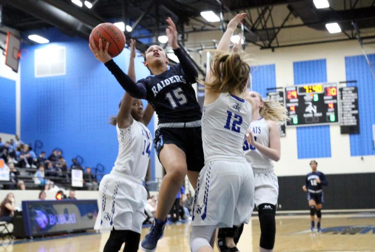 Myra Gordon (15) takes a shot against Trophy Club Nelson.