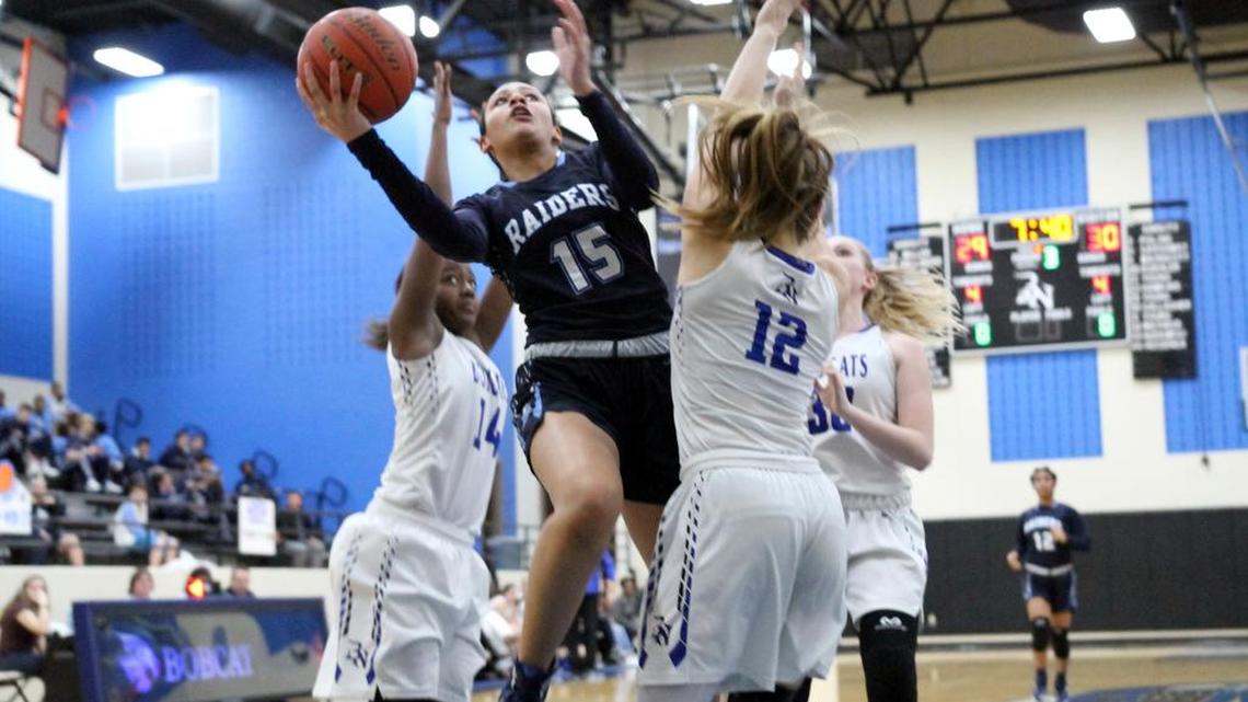 Myra Gordon (15) takes a shot against Trophy Club Nelson.
