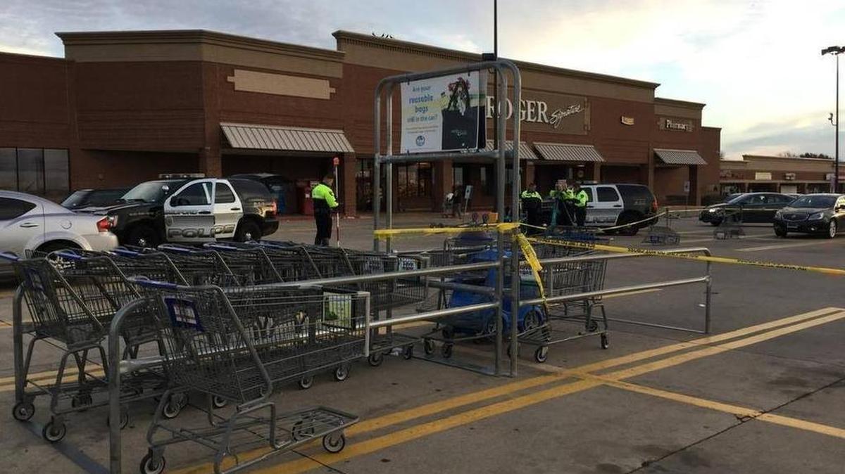 The crime scene at a Bedford Kroger on Tuesday morning after a fatal shooting the evening before.