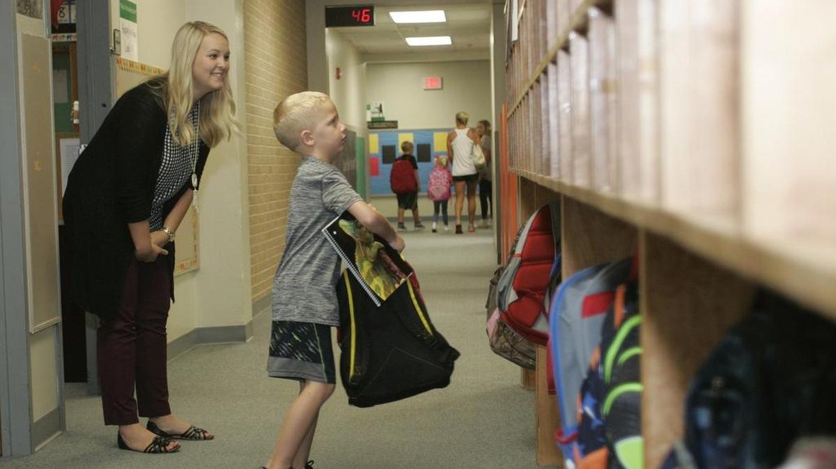 A pupil received some help negotiating the first day of school at Jack D. Johnson Elementary in Southlake.