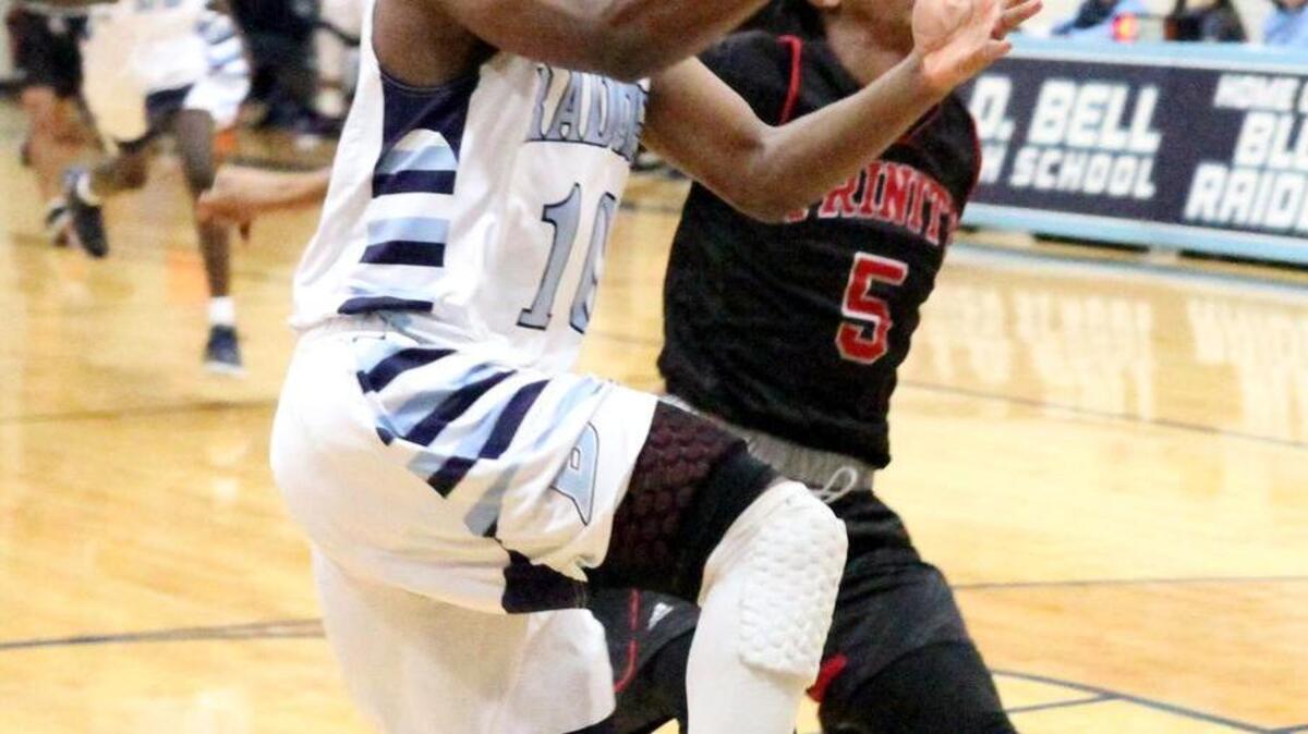 Orphee Matafadi shoots in Bell’s recent district victory against Trinity. The senior plans to enter pharmacology as a career.