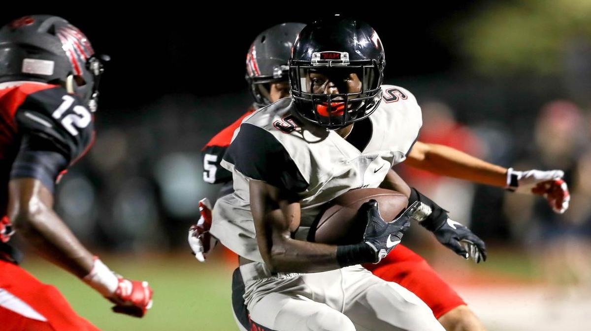 Trinity RB Greg Garner (5) rushed for three touchdowns against Colleyville Heritage.