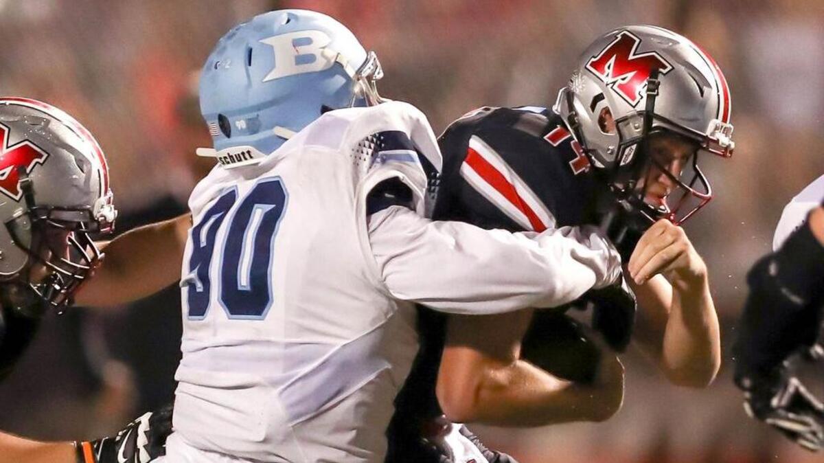 L.D. Bell defensive lineman Keroles Dawed sacks Marcus quarterback Michael Henry in September. Dawed has five sacks and 11 tackles for loss this season.