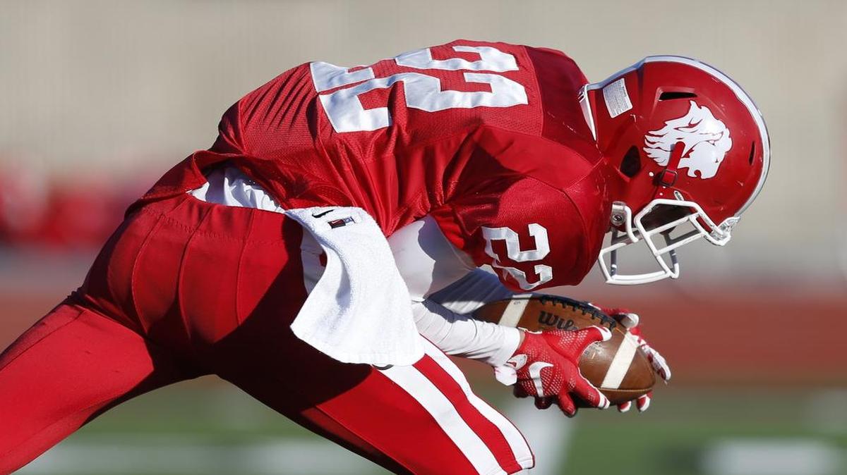 Grapevine Faith receiver and safety Jake Mitchell (22) was all-state last season.