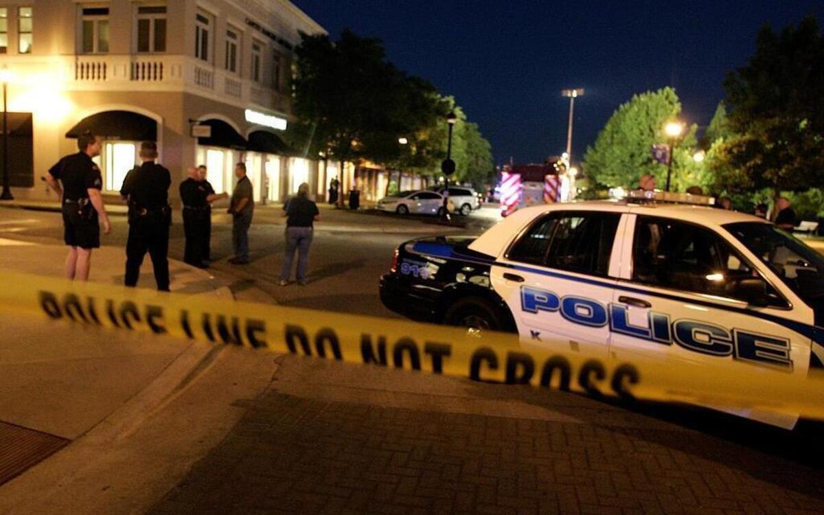 Police officers in Southlake Town Square on Wednesday, May 22, 2013, after a lawyer was gunned down.