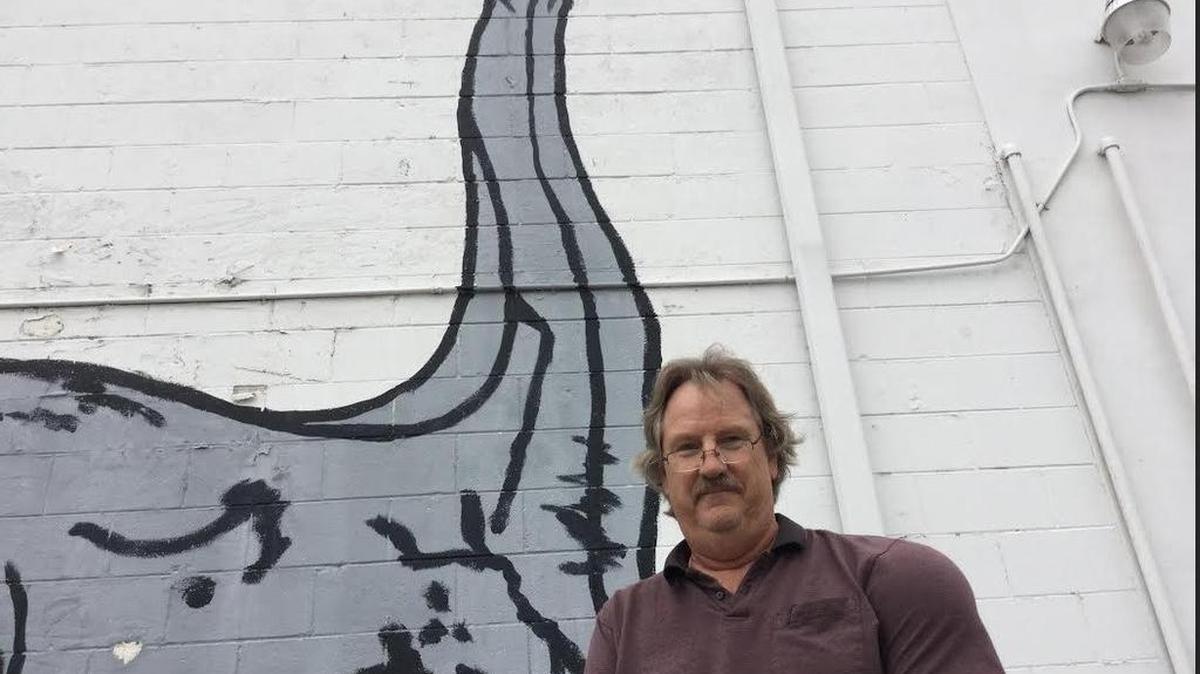 Andrew Sansom will get to keep his brontosaurus which is on the outside wall of Andrews News Stand in Haltom City. City officials had asked him to paint over it because it was graffiti, but they changed their minds.