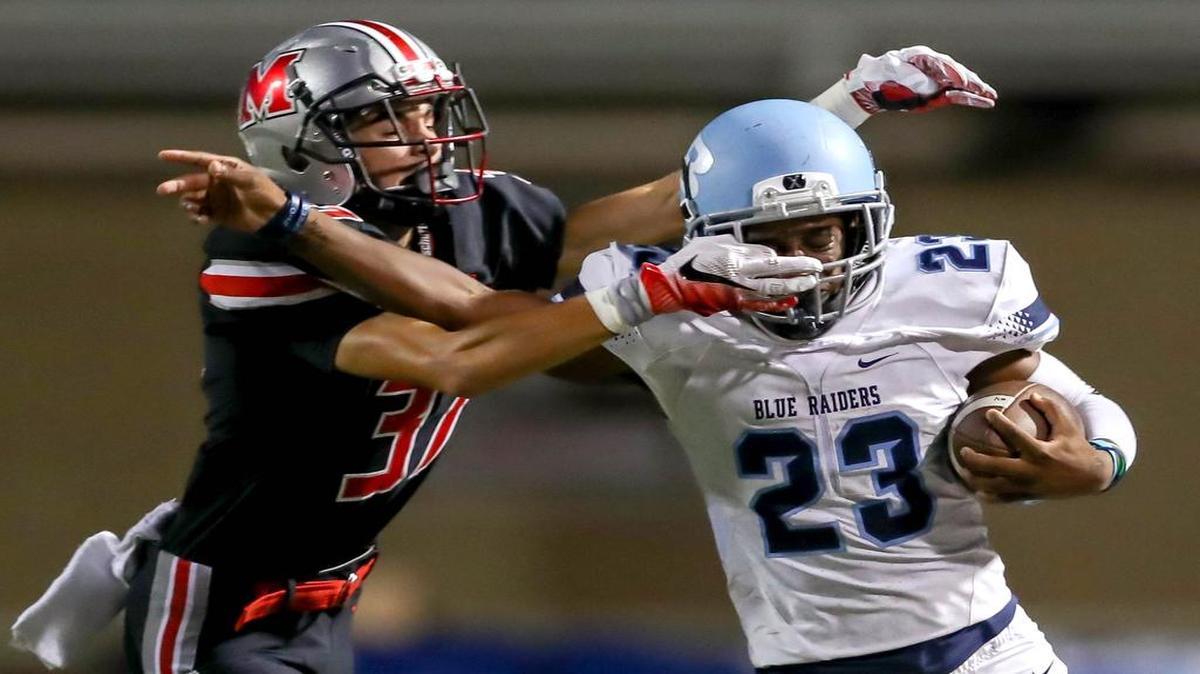 L.D. Bell senior running back Ivan Traylor, right, compiled 11 rushing touchdowns and 1,149 all-purpose yards this season.