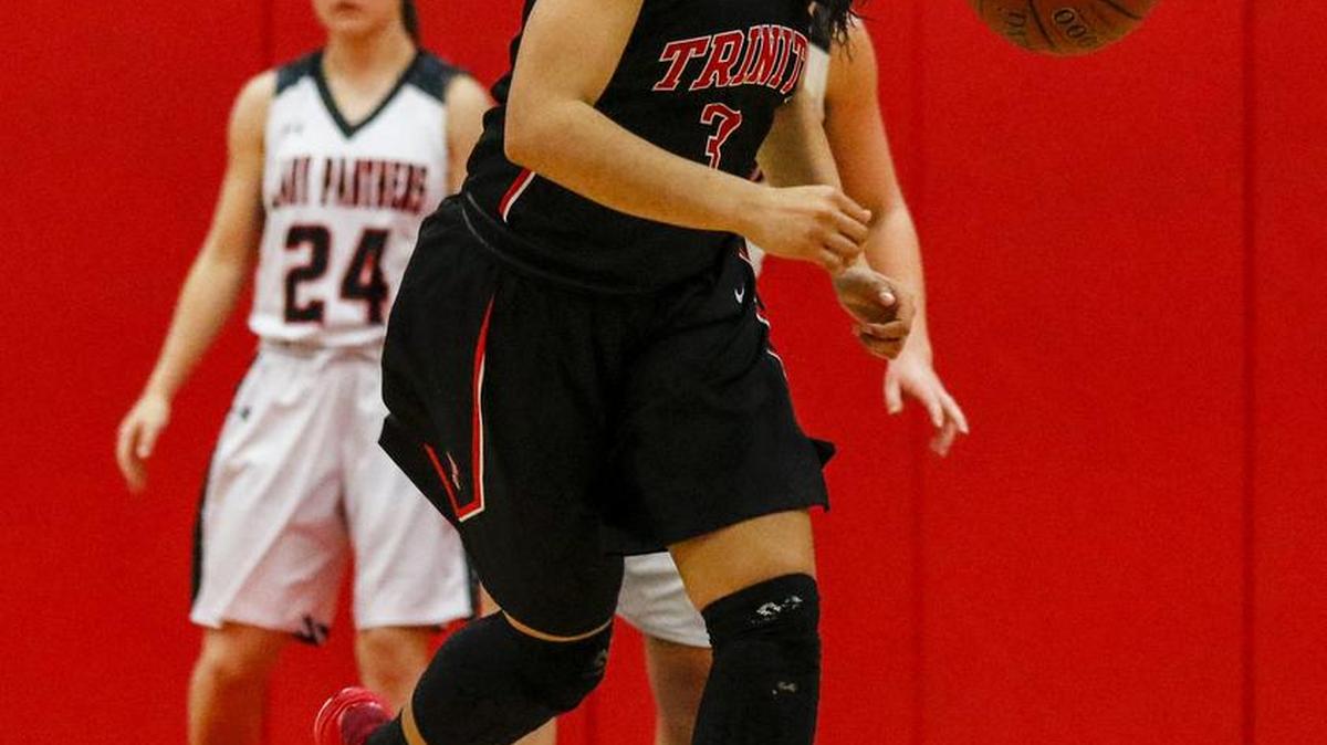 Scoring 20, Trinity Oliver (3) had more points than any other player in the Lady Trojans’ loss to Flower Mound.