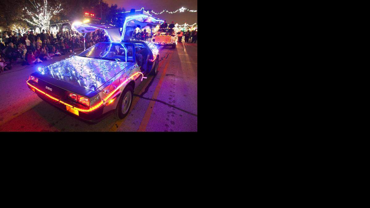 
Jake Mowrer drives his decorated DeLorean along Main Street. More than 100 lighted floats rolled down the street. 
