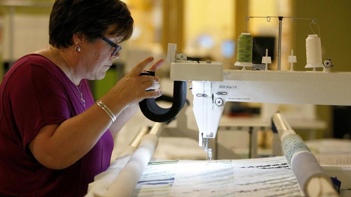 Kipi Fleming of Hurst makes a quilt at The Maker Spot inside the North Richland Hills Public Library.
