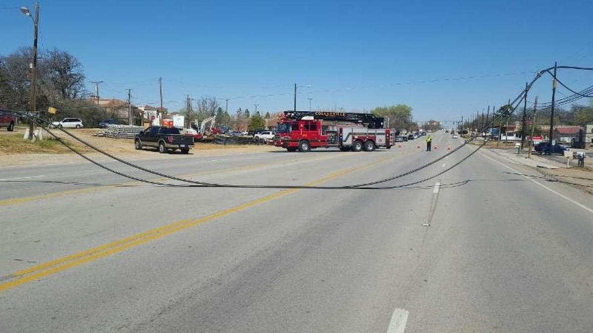A downed power line has shut down Texas 26 in Colleyville.