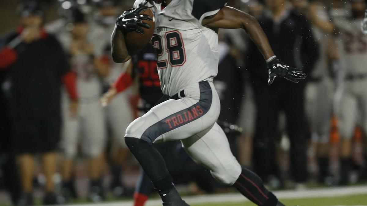 Trinity running back Ja'Ron Wilson runs for a touchdown against Coppell in last week’s victory.