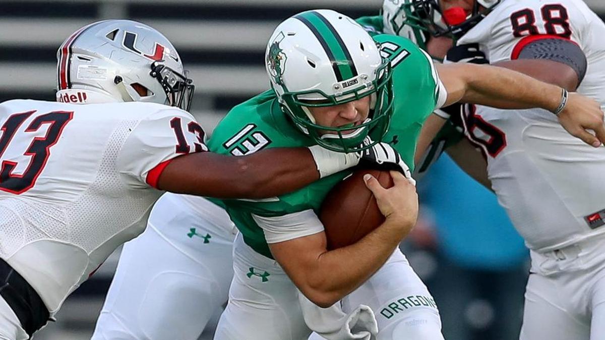 Southlake Carroll QB Mason Holmes (13) has been running more, and head coach Hal Wasson said he’s glad to see it.