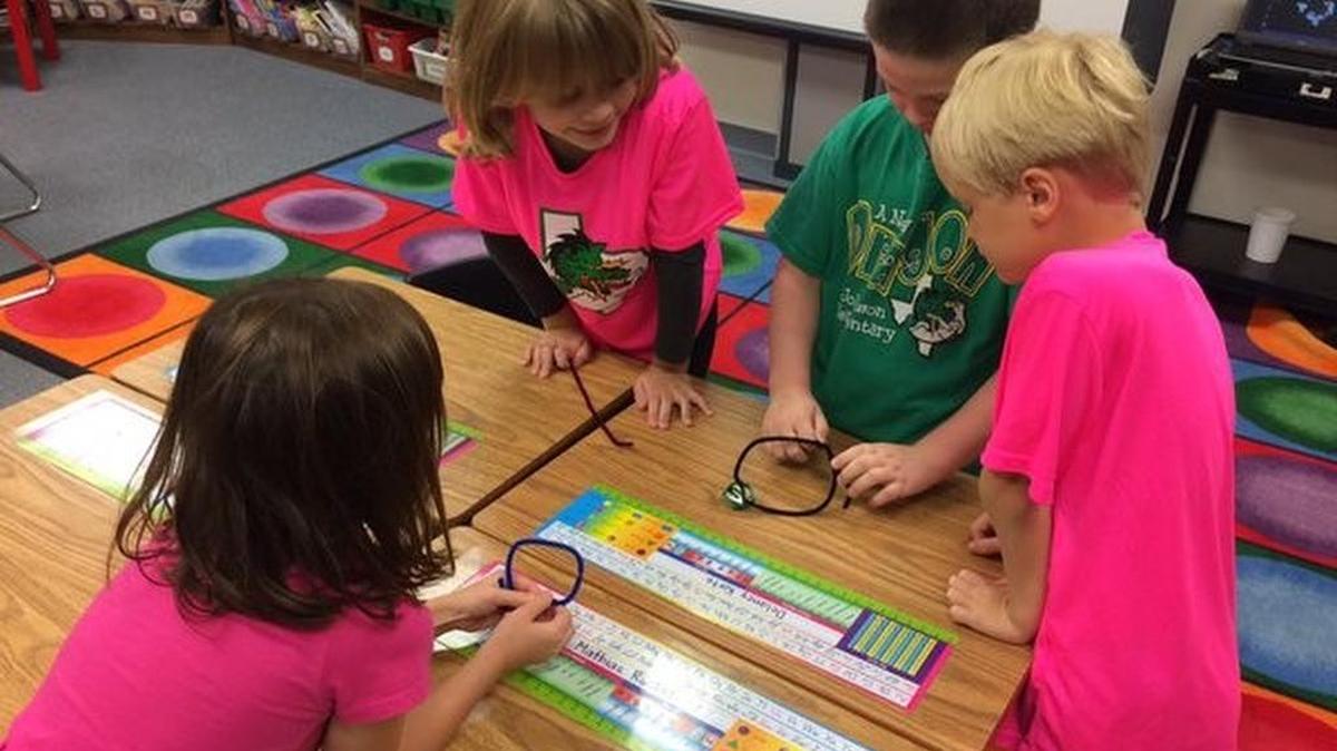 Students at Johnson Elementary School work on a group activity. Johnson is one of three CISD schools nearing capacity.