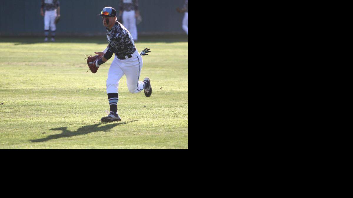 
Bell senior Jordan Satterwhite takes part in a fielding drill before last Thursday’s game against Fort Worth Southwest.
