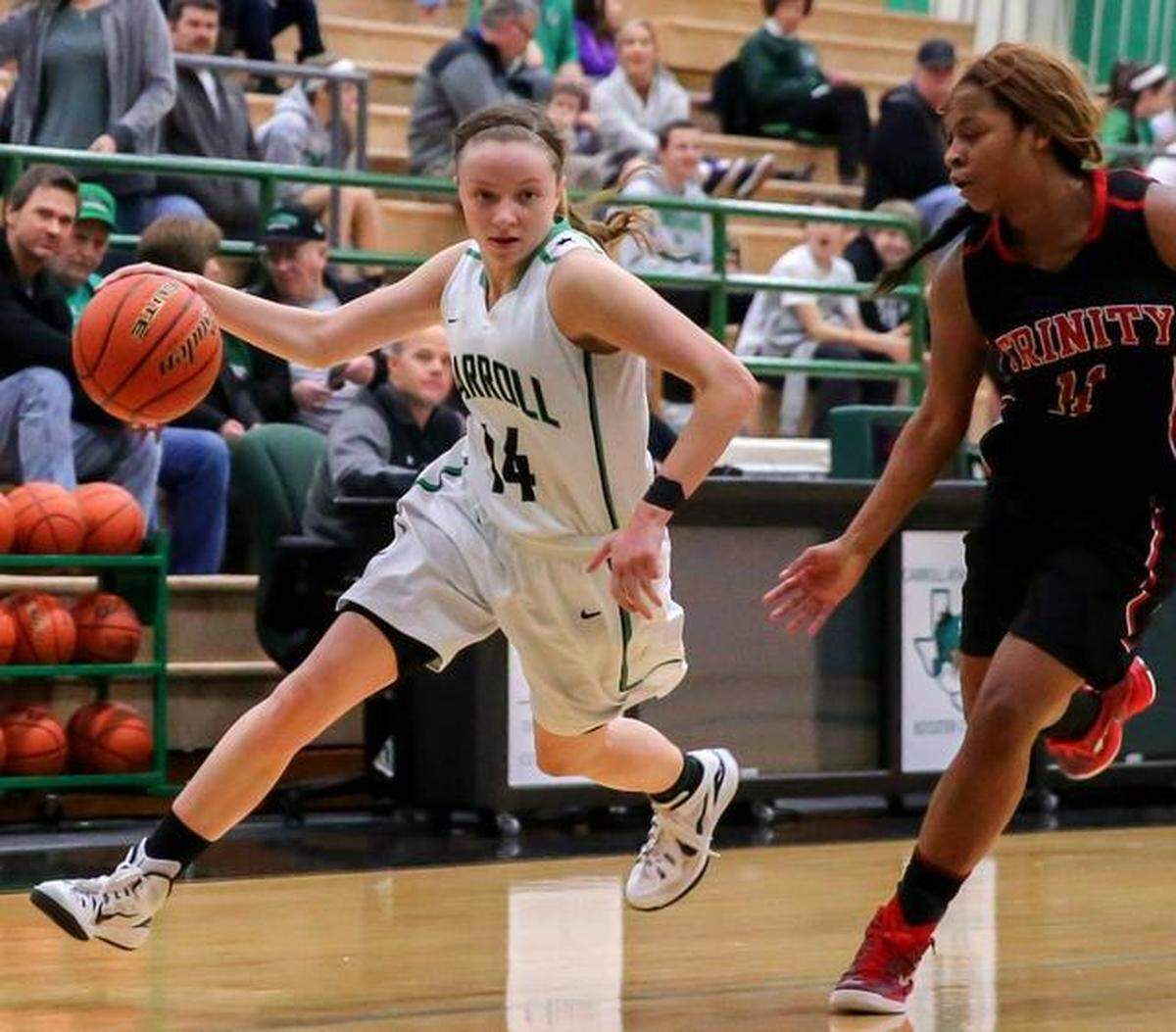 Former Southlake Carroll point guard Kennedy Leonard (14)