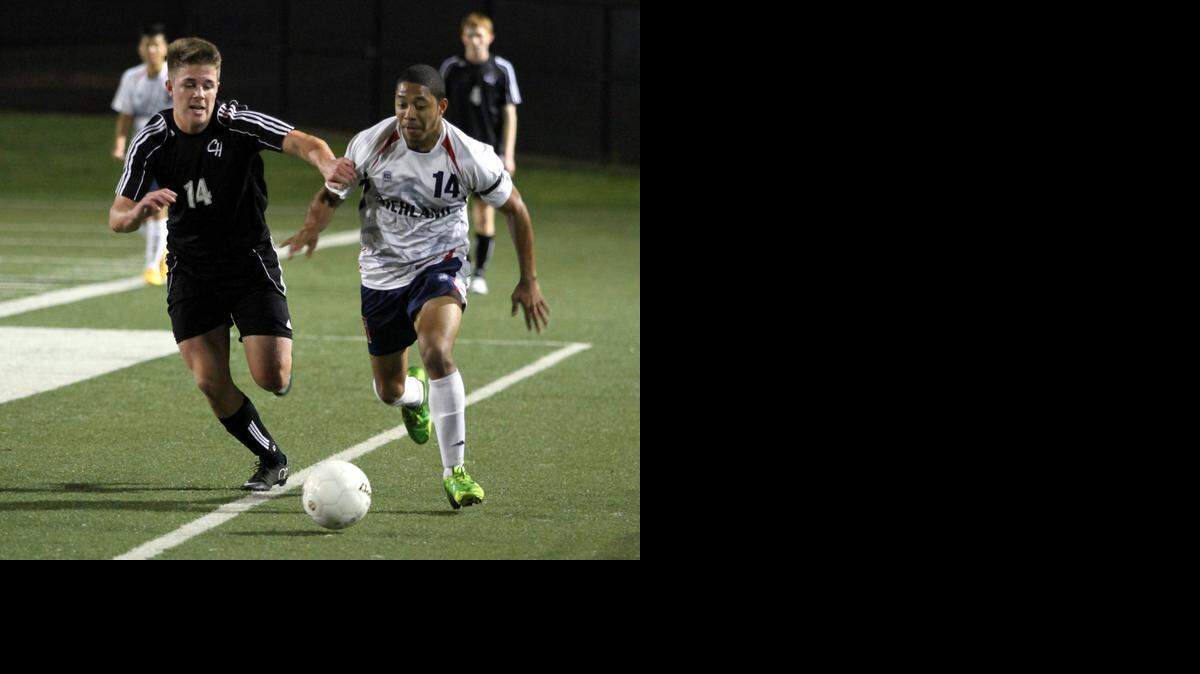 
Colleyville Heritage’s Connor Cole, left, races a Richland defender in the season-finale victory last week.
