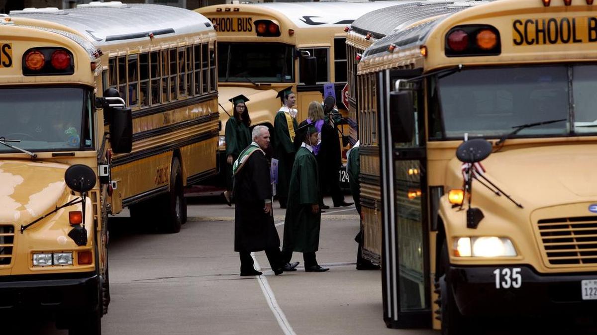 Carroll officials hope to replace a number of aging buses with funds from the next bond package. On June 3, teachers, administrators and graduates boarded buses at Dragon Stadium.
