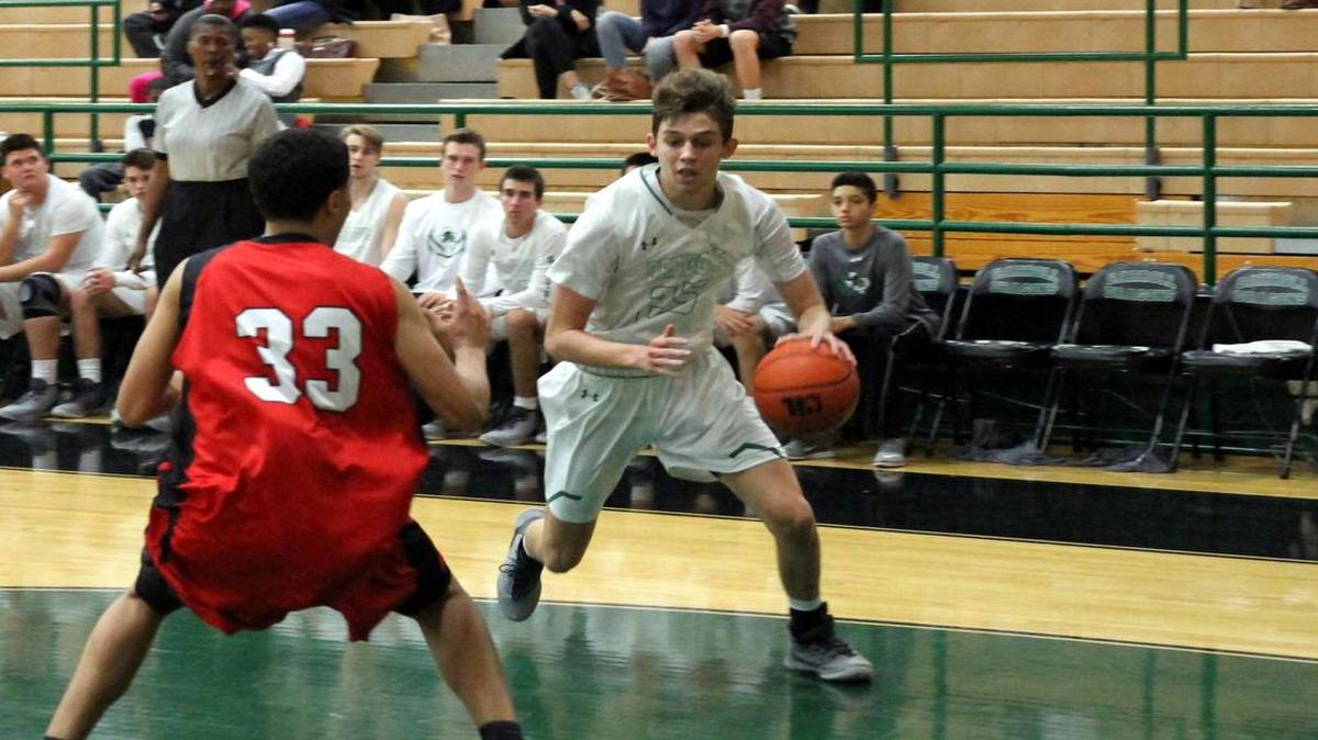 Carroll’s Sam Bourcy (25) had 14 points in the Dragons’ upset win over Hebron. The teams clash again on Friday.
