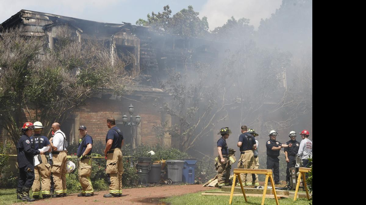 
Firefighters worked to put out a house fire in Colleyville on Thurseday. Two people who were inside the home were still missing by mid-afternoon.
