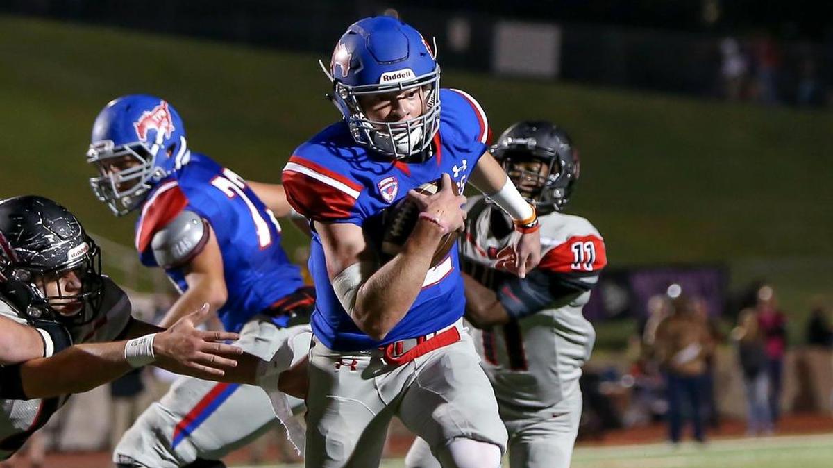 Grapevine QB Alan Bowman goes in for a touchdown against Colleyville Heritage last week.