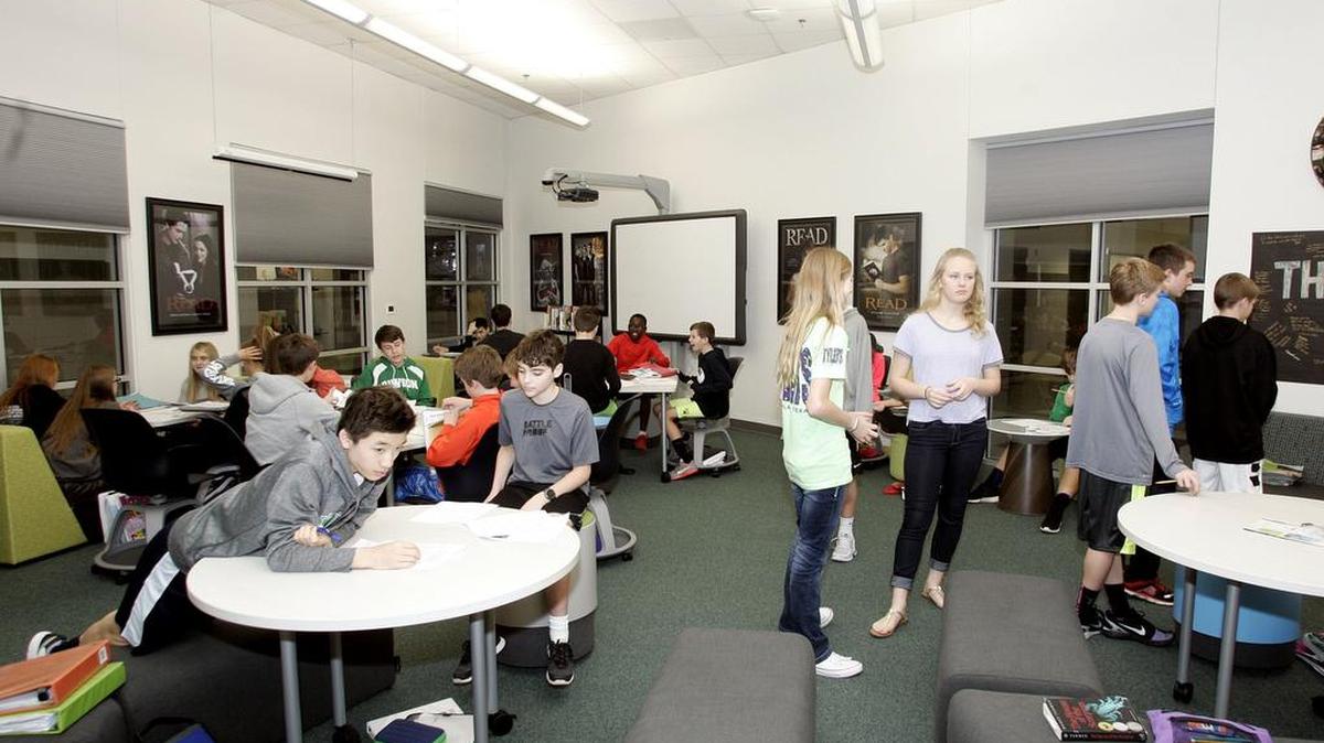 A seventh grade pre AP science class studies in George Dawson Middle School’s remodeled library Feb. 4.
