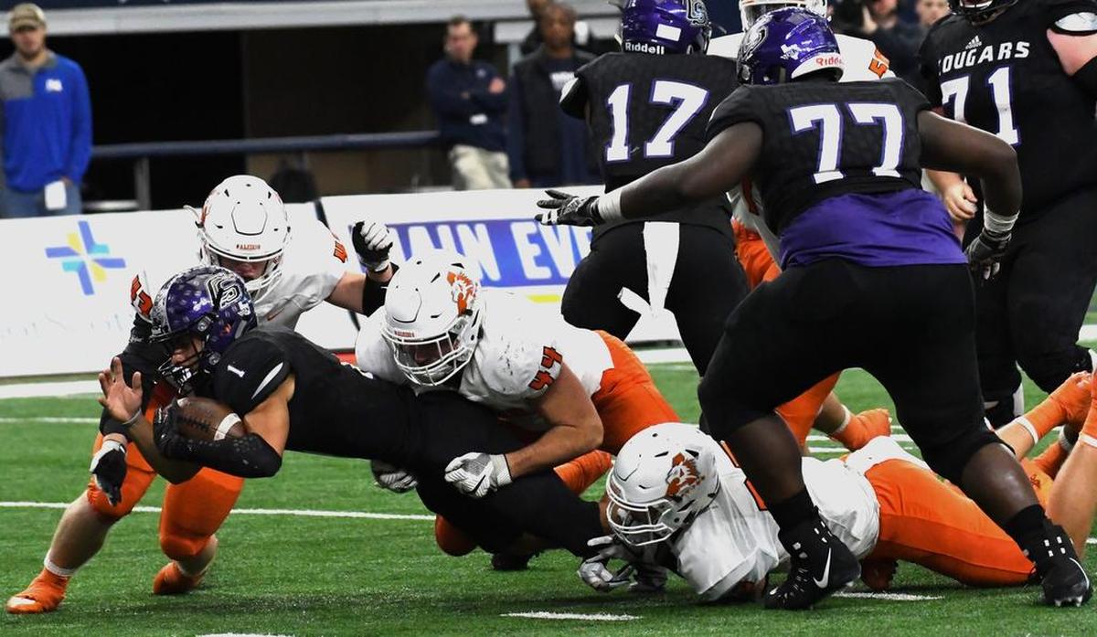 Aledo’s Colt Ellison (44) keep College Station’s quarterback Marquez Perez (1) from getting into the end zone during Saturday’s UIL State Championship final at AT&T Stadium in Arlington.