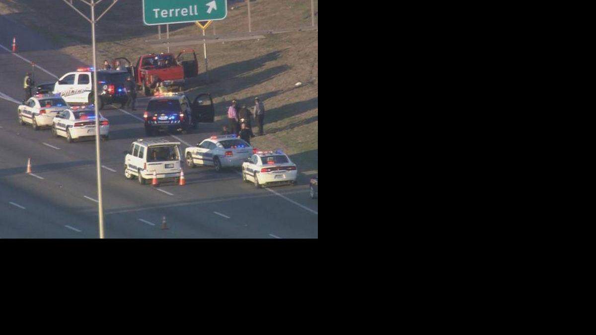 

Police surround a red pickup on a shoulder of Interstate 635 in Mesquite after the driver shot himself and a passenger, James Guill Jr., 30, wanted in Arlington, was arrested.


