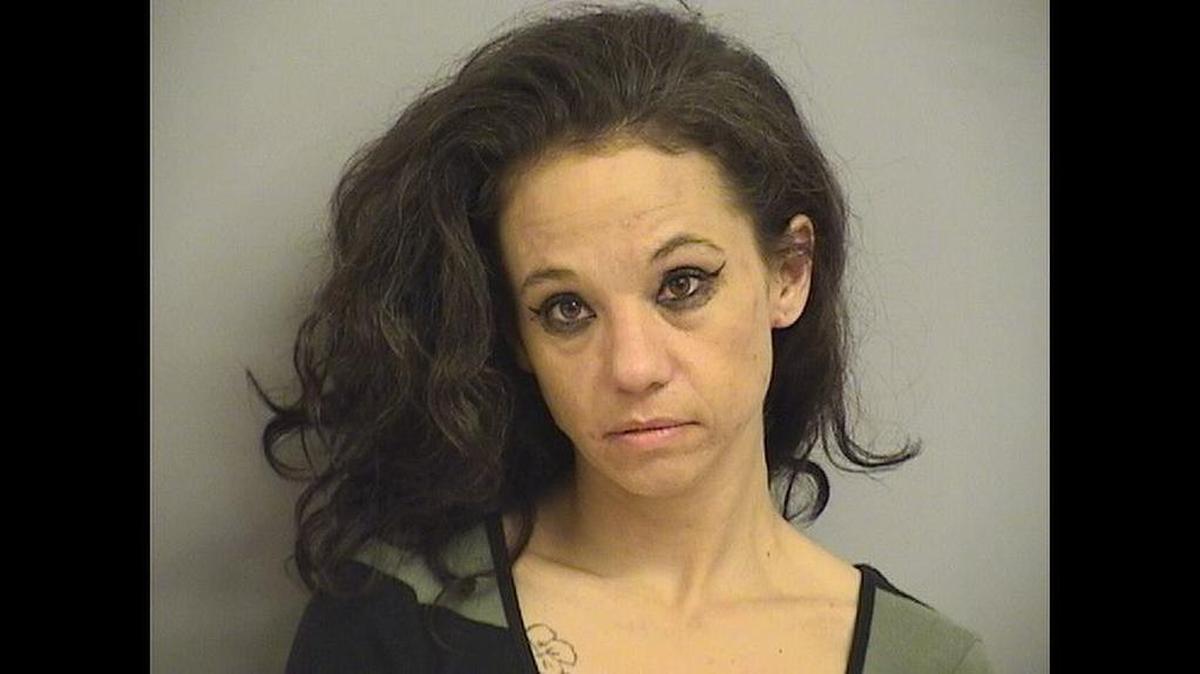 Angie Frost, 36, was arrested early Friday for allegedly driving two stolen vehicles. One was allegedly the cop car she tried to get away in after slipping her handcuffs.