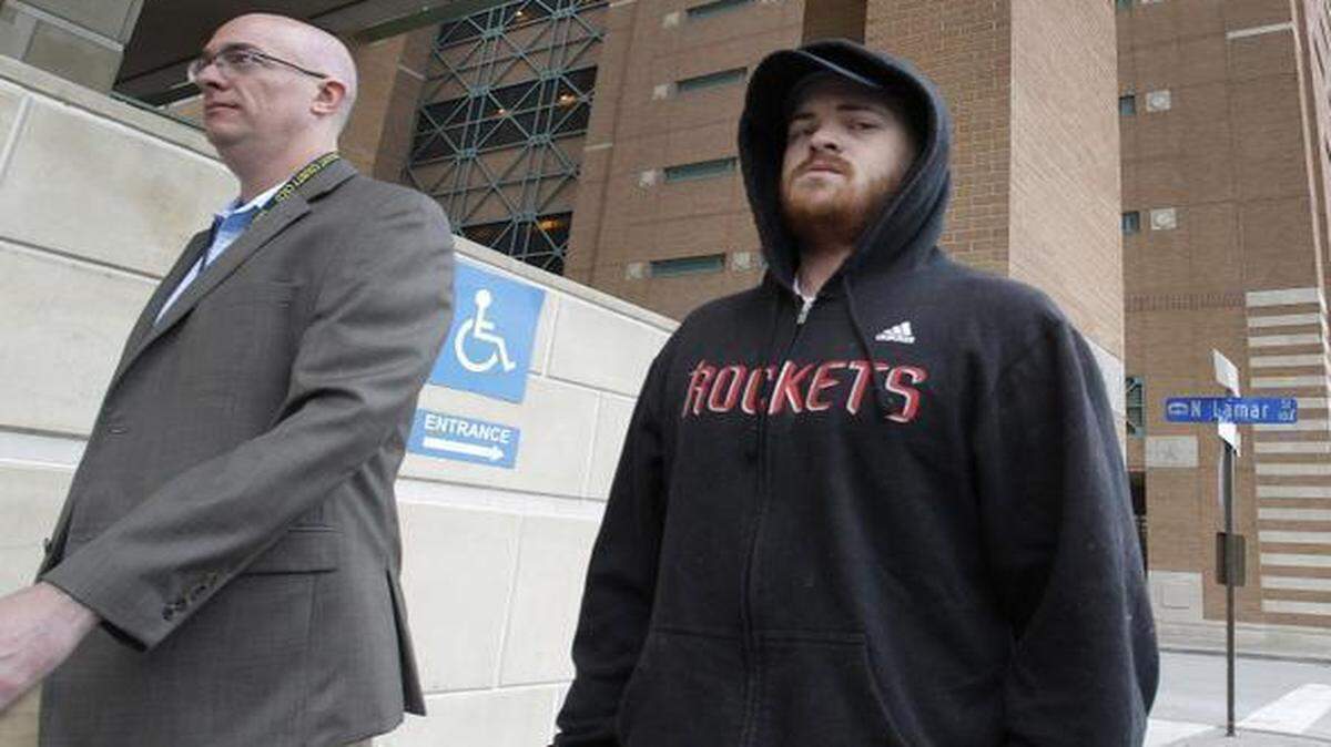
Bernard Joseph Gorman, the 26-year-old Irish Traveller charged with murder in the death of a housekeeper in Colleyville, leaves the Tarrant County Jail Tuesday, escorted by officers. 
