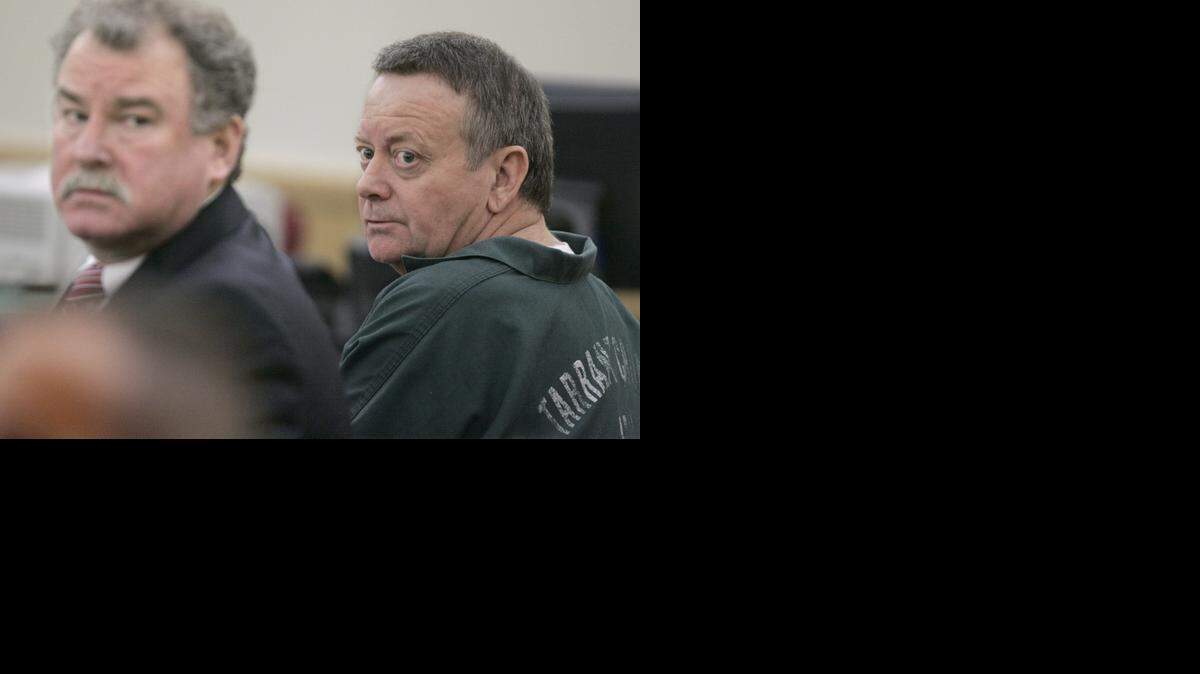 
Harold Michael Moore, right, a chronic drunk driver, waits in the courtroom with attorney Tim Moore for sentencing on his seventh DWI case back on April 12, 2006. 
