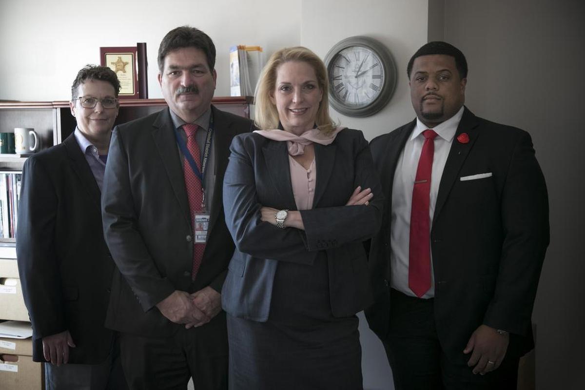 Criminal investigators Dara Couch, Ron Bonham and assistant criminal district attorneys Lori Varnell and Ty Stimpson are part of the Tarrant County District Attorney’s office that investigates financial abuse of the elderly and disabled.