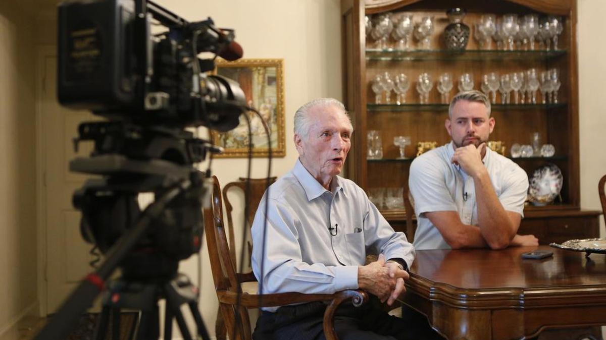 Cullen Davis, left, and Jon Farr speak in front of the “48 Hours” cameras in 2016.