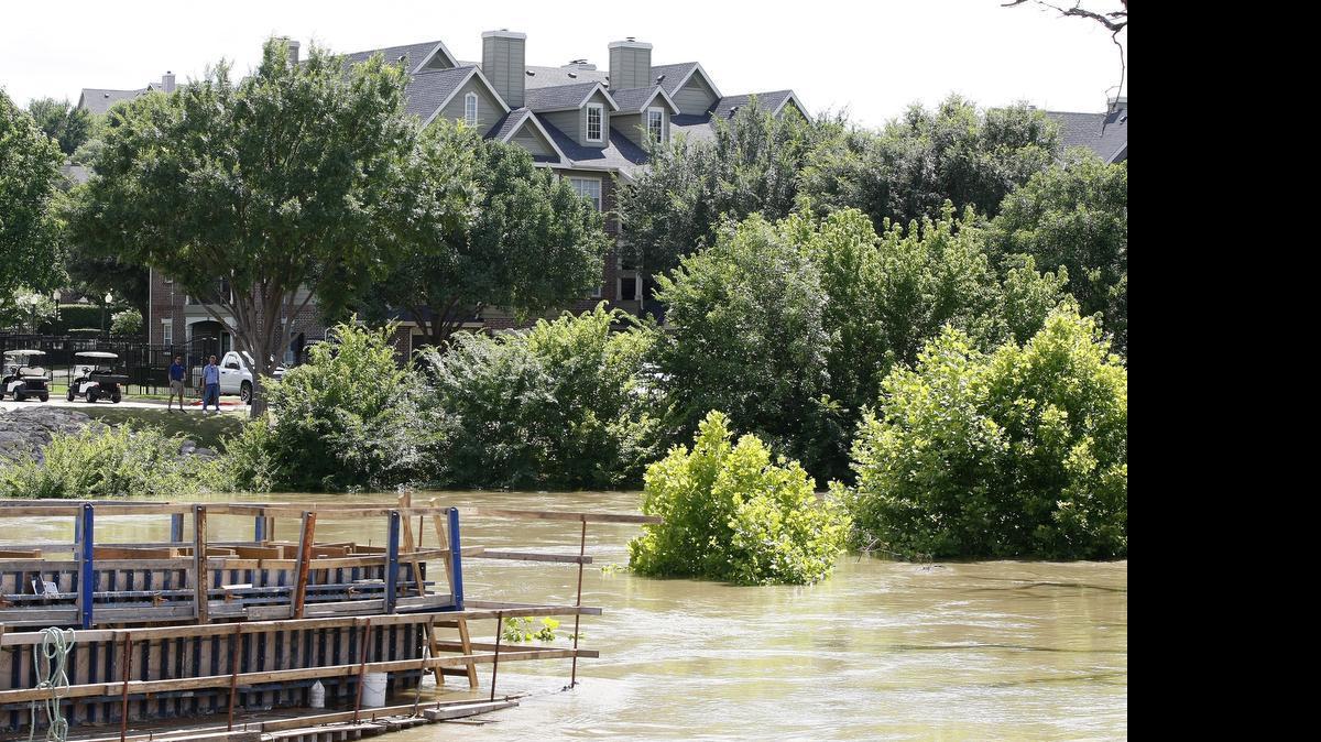 
Water levels on Denton Creek threatened nearby apartment complexes in Grapevine on Thursday.
