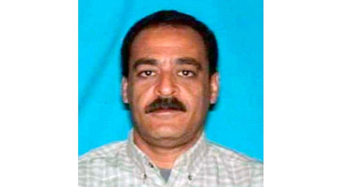 FILE - This undated file photo provided by the Irving (Texas) Police Department shows Yaser Said. Said, who evaded arrest for over 12 years after being accused of fatally shooting his two teen daughters in a taxi parked near a Dallas-area hotel, is on trial this week.