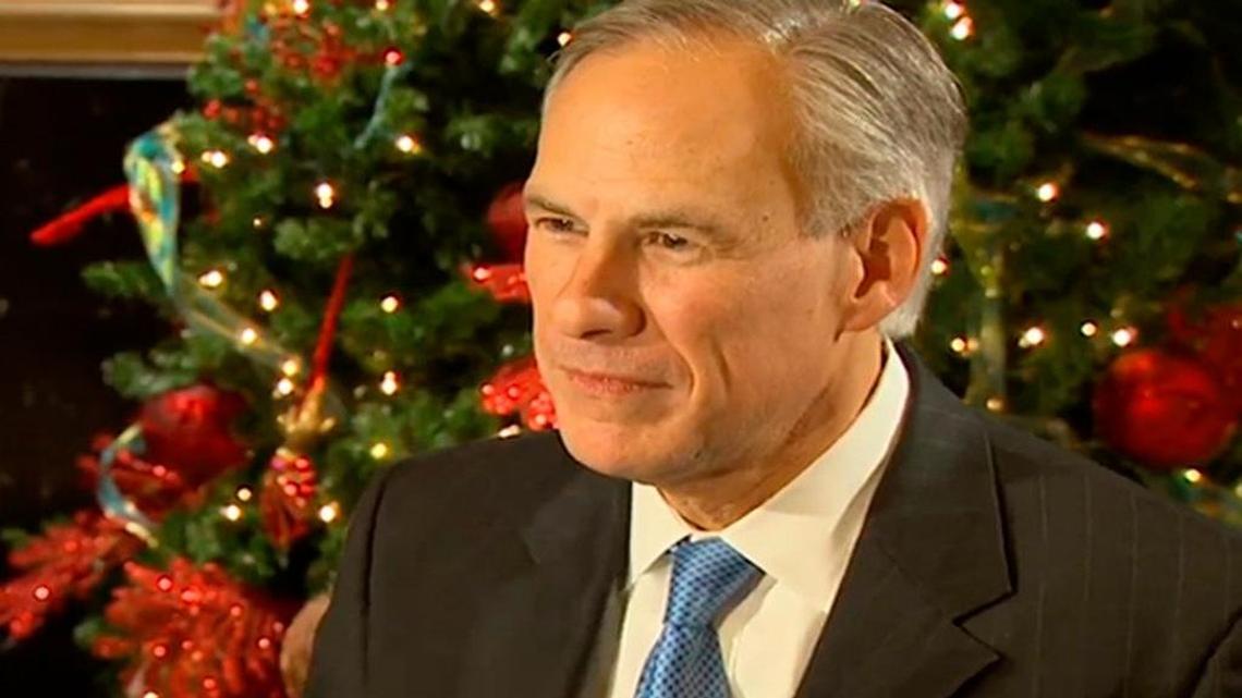 Texas Gov. Greg Abbott speaks to reporters at the Intercontinental Hotel in Addison Thursday night, Dec. 10, 2015.